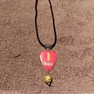 THE BEATLES NUMBER ONES GUITAR PICK NECKLACE